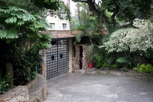 Hotel Pension Stein - Front gate and guard house (guard carries a revolver)