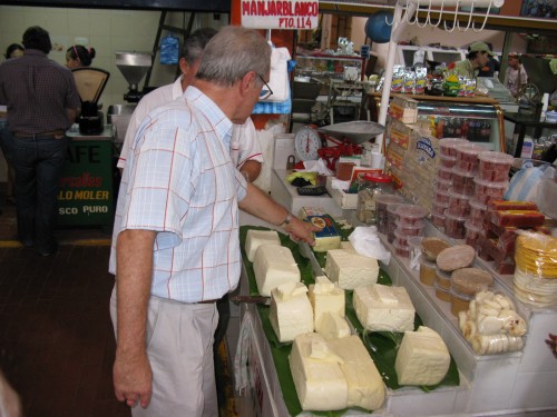 Enrique picks out some Colombian cheese