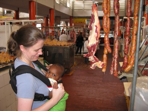 Leanne and Andres hang out around some meat