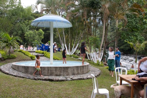 The Italian family enjoying the wading pool