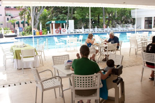 Leanne and Andres at breakfast by the pool