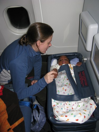 Andres in his bassinet on board our flight to Auckland